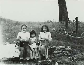 3 girls on a log